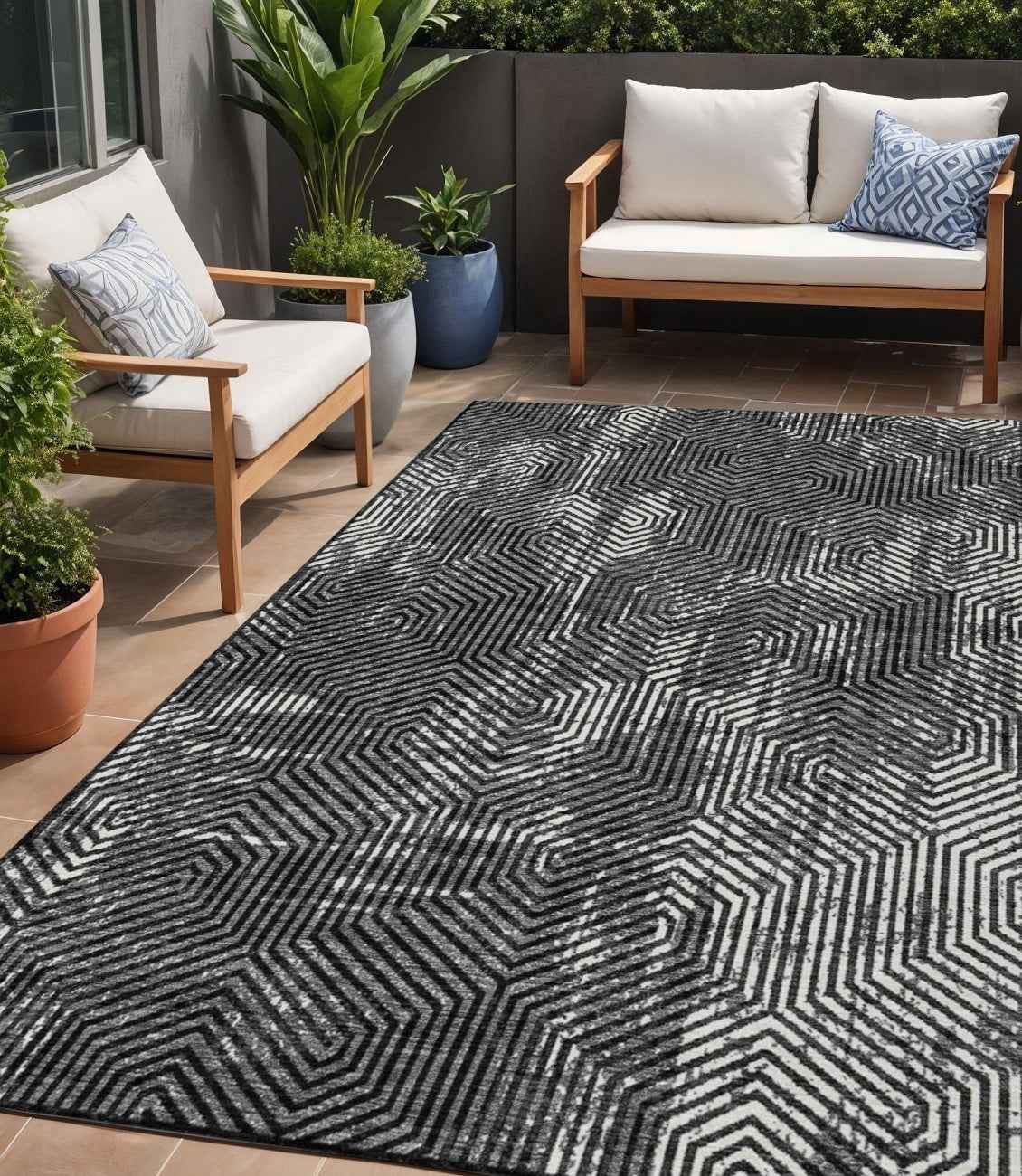 5' X 8' Black And Ivory Geometric Washable Indoor Outdoor Area Rug