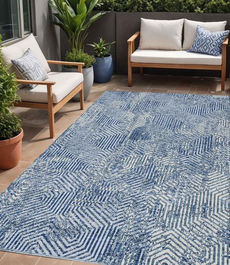 5' X 8' Navy Blue And Ivory Geometric Washable Indoor Outdoor Area Rug