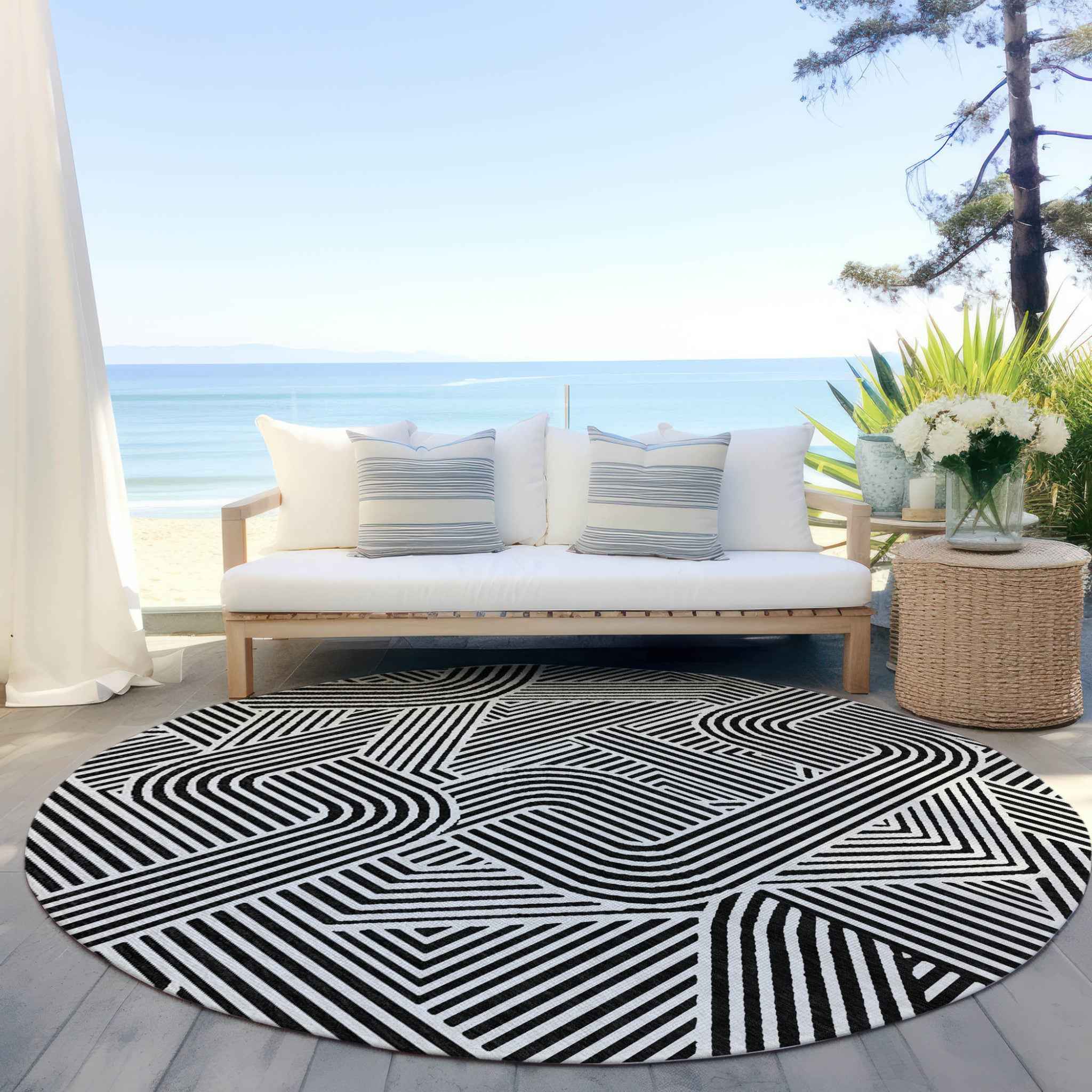 8' Black And Ivory Round Abstract Washable Indoor Outdoor Area Rug