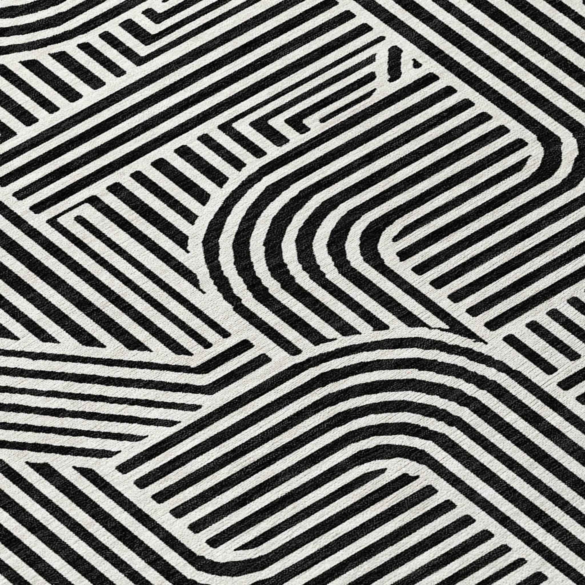 8' Black And Ivory Round Abstract Washable Indoor Outdoor Area Rug