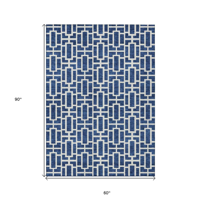 5' X 8' Navy Blue And Ivory Geometric Washable Indoor Outdoor Area Rug