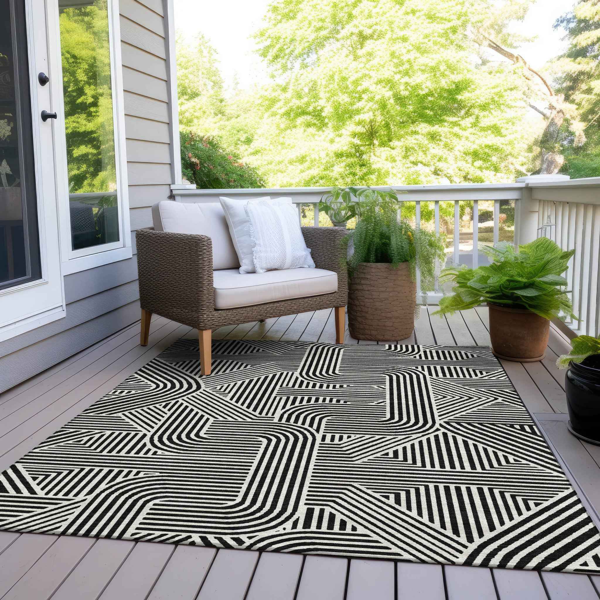 5' X 8' Black And Ivory Abstract Washable Indoor Outdoor Area Rug