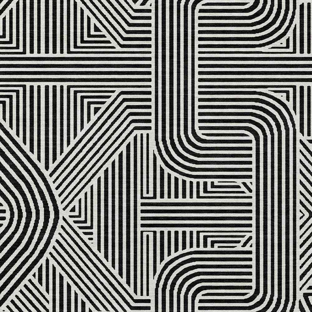 5' X 8' Black And Ivory Abstract Washable Indoor Outdoor Area Rug