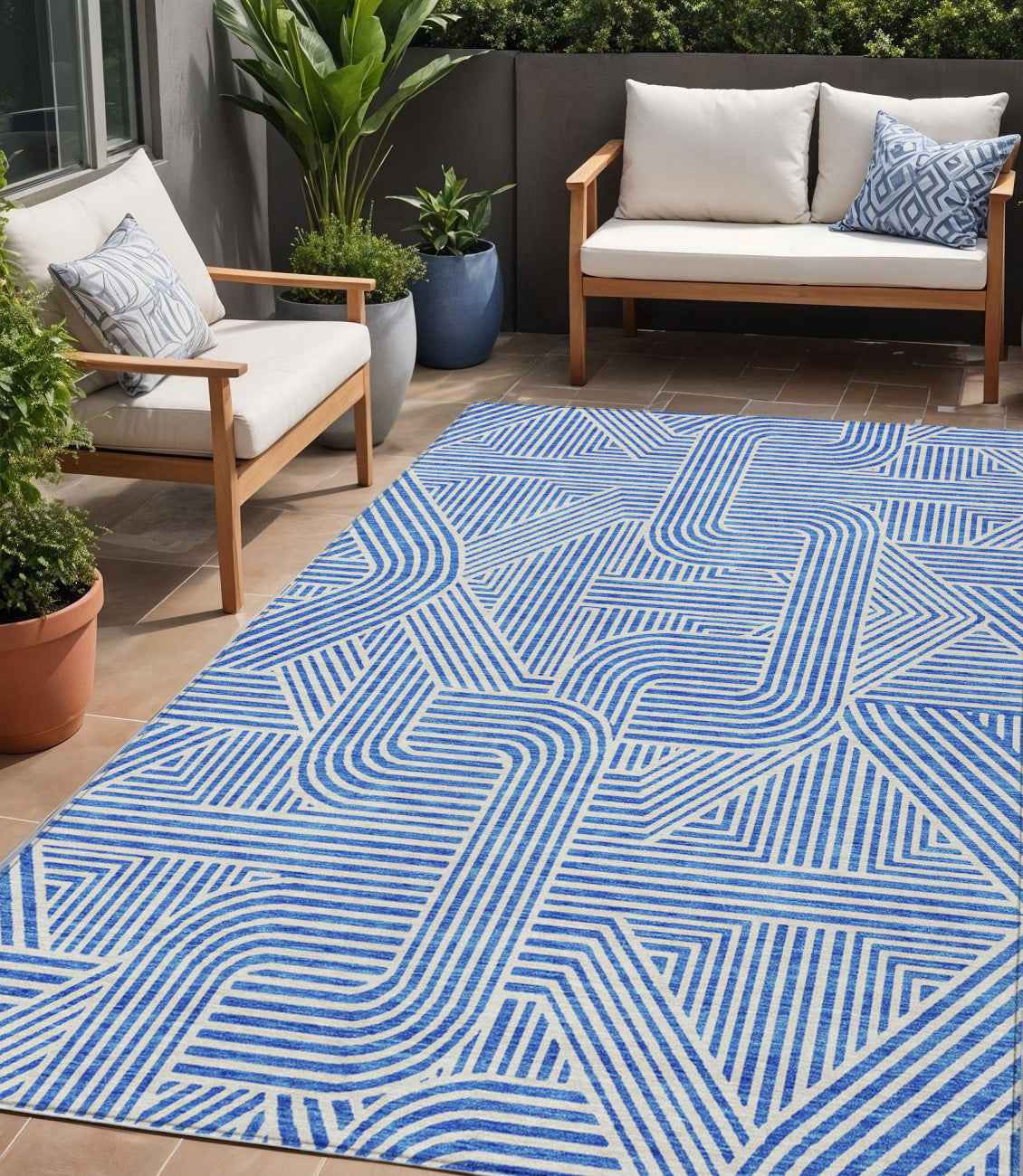 5' X 8' Blue And Ivory Abstract Washable Indoor Outdoor Area Rug