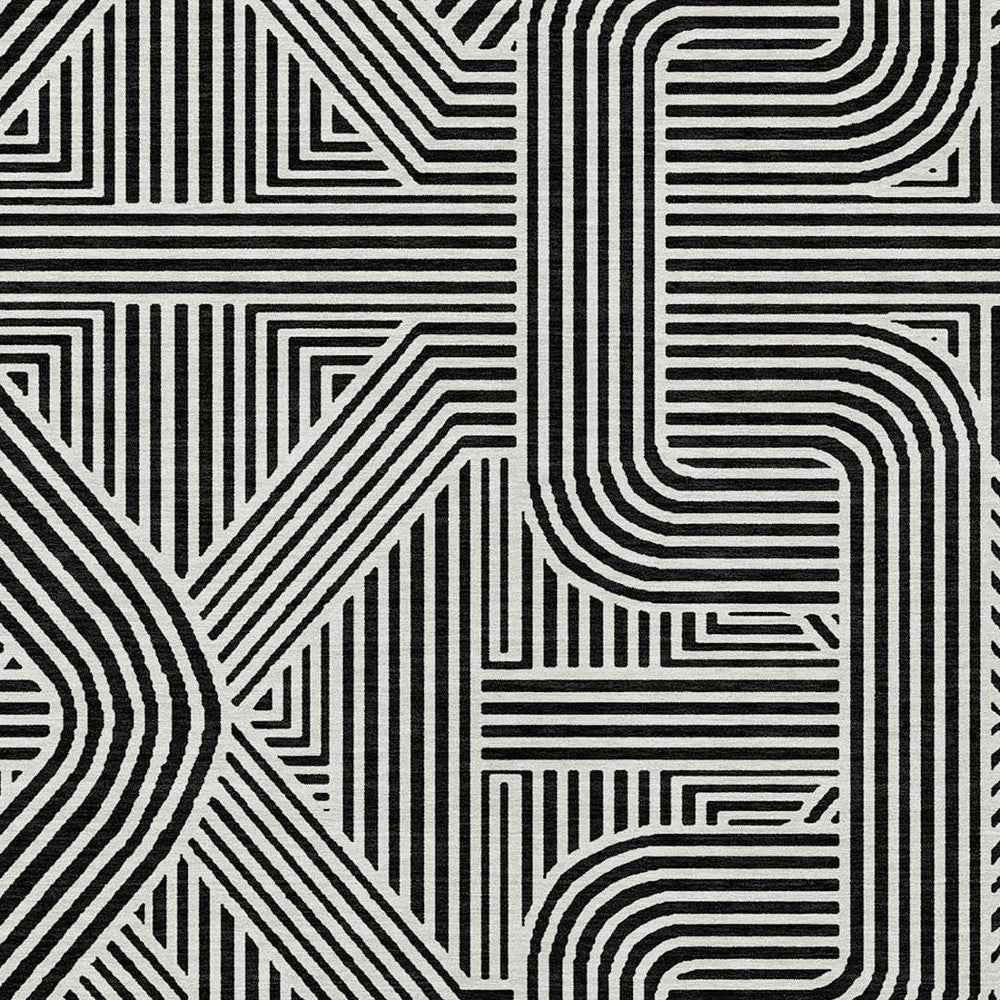 9' X 12' Black And Ivory Abstract Washable Indoor Outdoor Area Rug