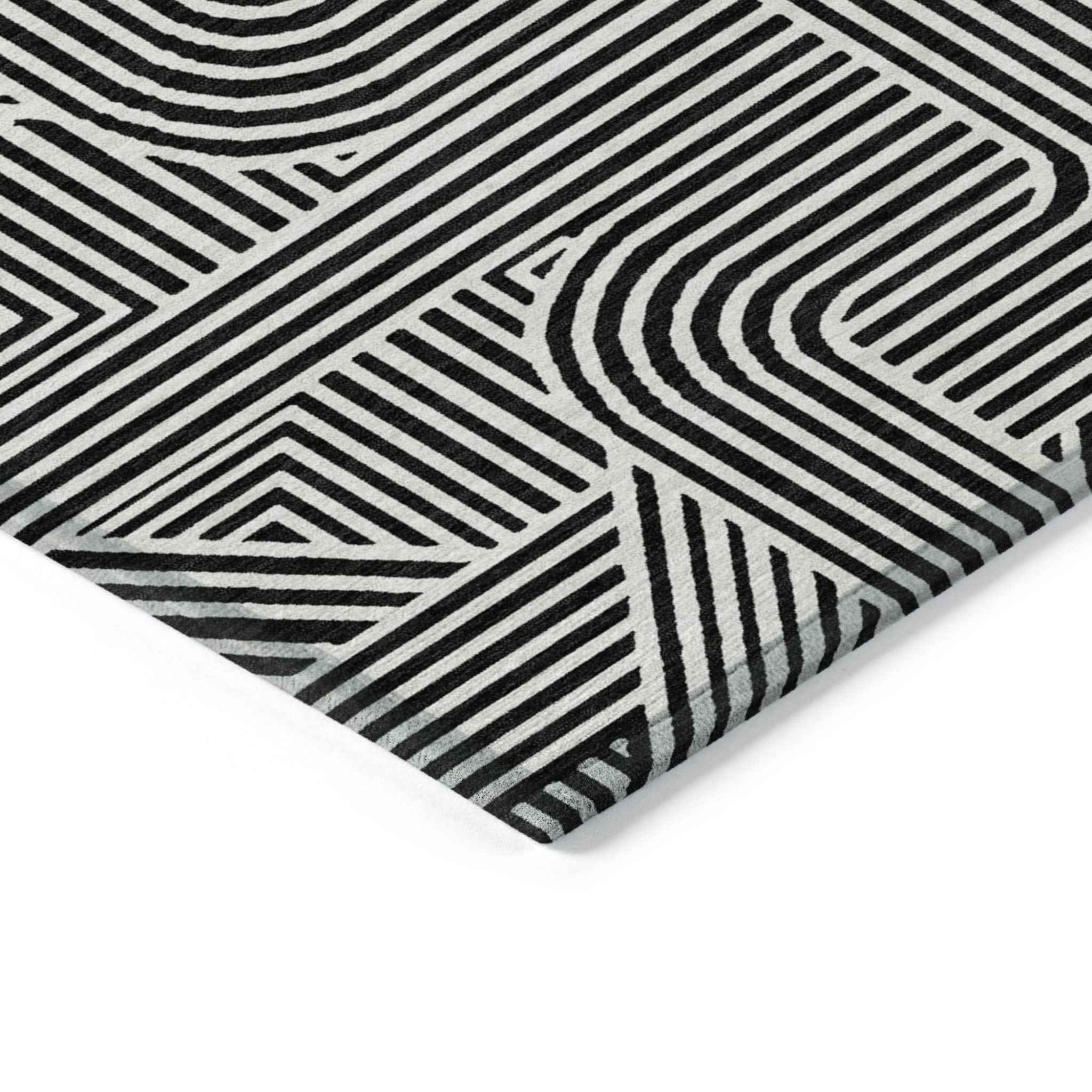 9' X 12' Black And Ivory Abstract Washable Indoor Outdoor Area Rug