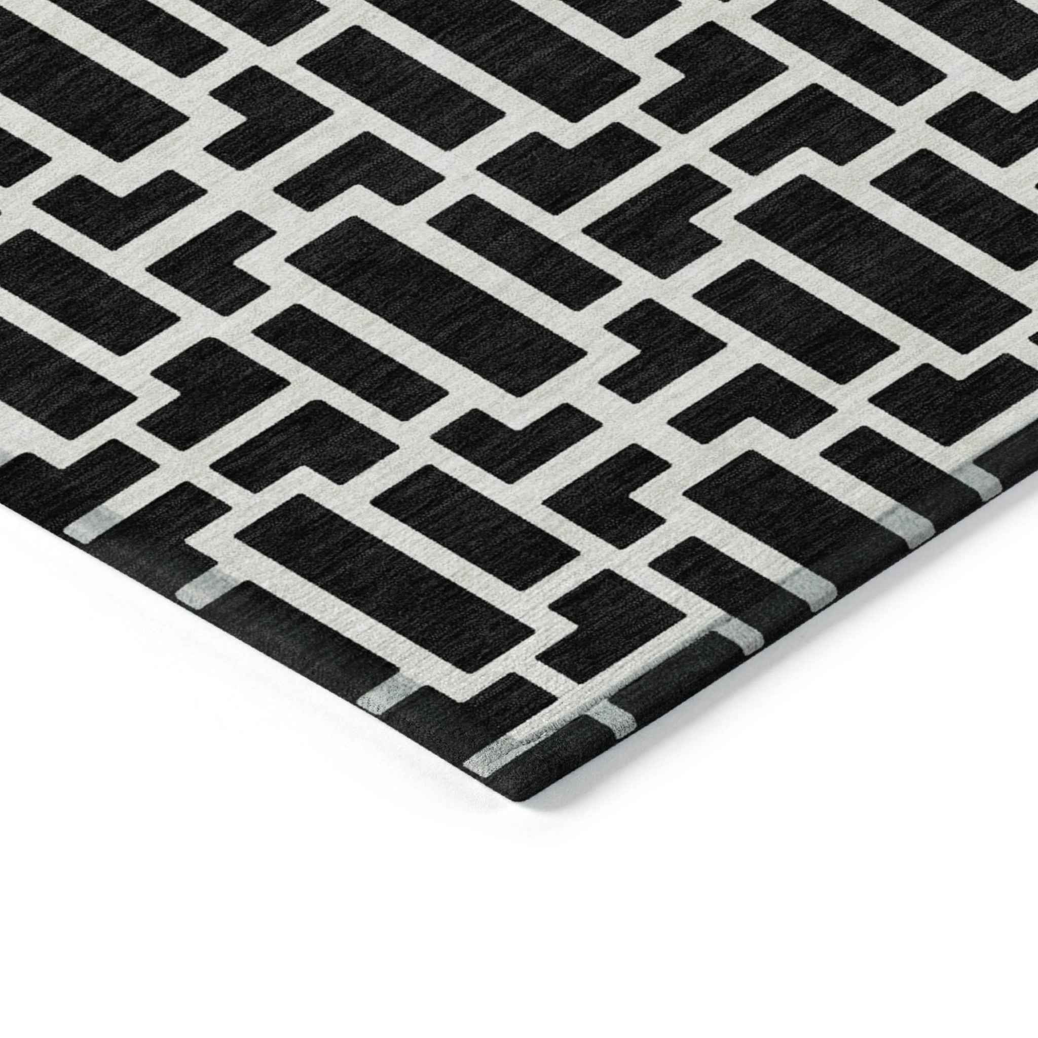 3' X 5' Black And Ivory Geometric Washable Indoor Outdoor Area Rug