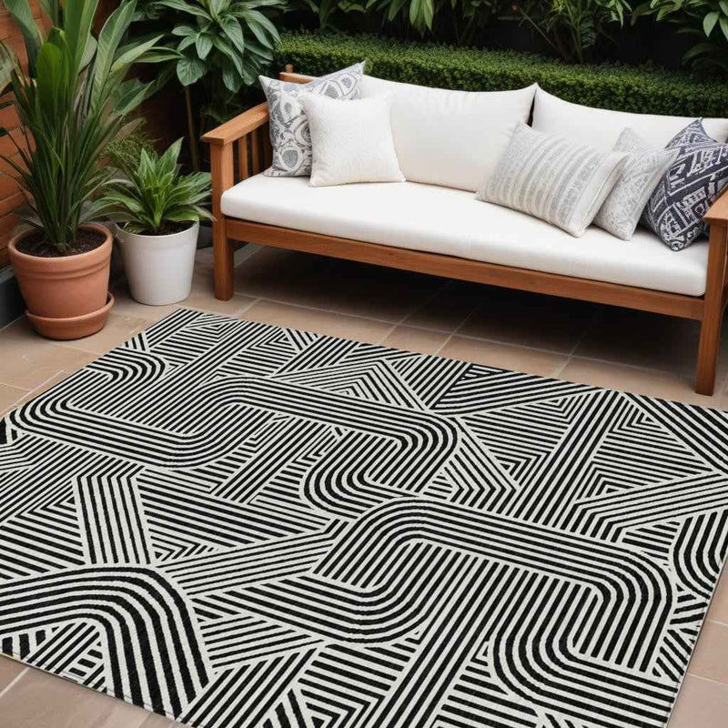 9' X 12' Black And Ivory Abstract Washable Indoor Outdoor Area Rug