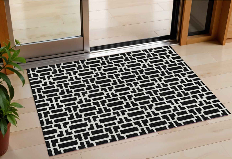 3' X 5' Black And Ivory Geometric Washable Indoor Outdoor Area Rug
