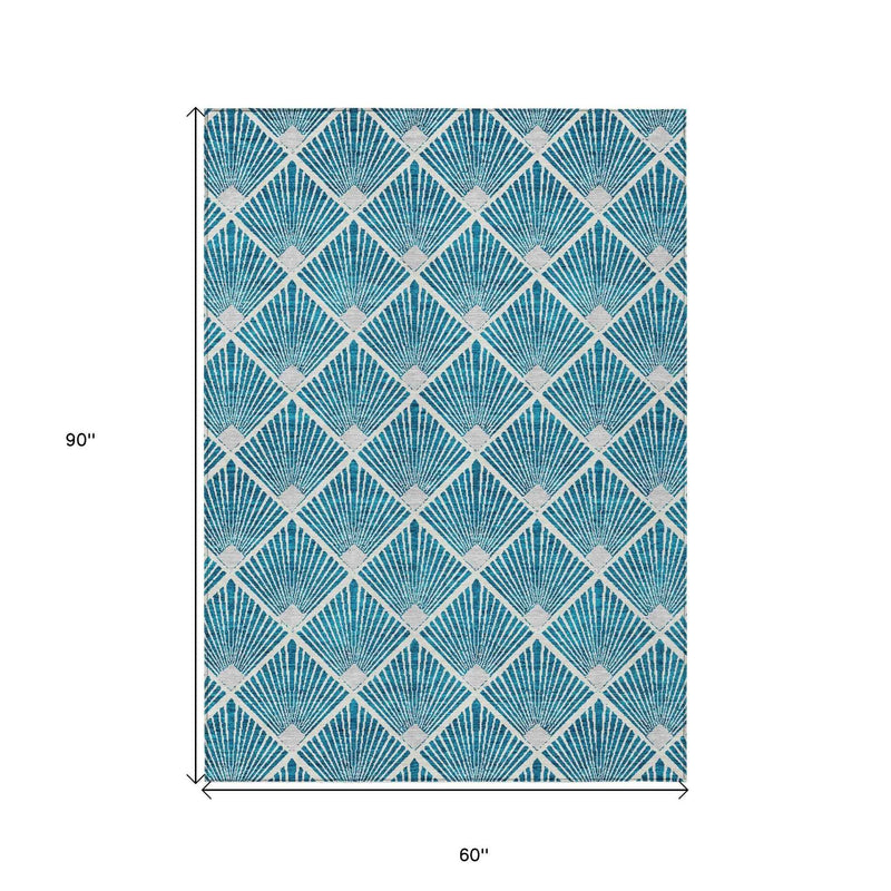 5' X 8' Teal Blue And Ivory Geometric Washable Indoor Outdoor Area Rug