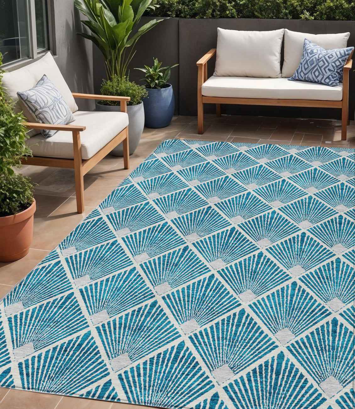 5' X 8' Teal Blue And Ivory Geometric Washable Indoor Outdoor Area Rug