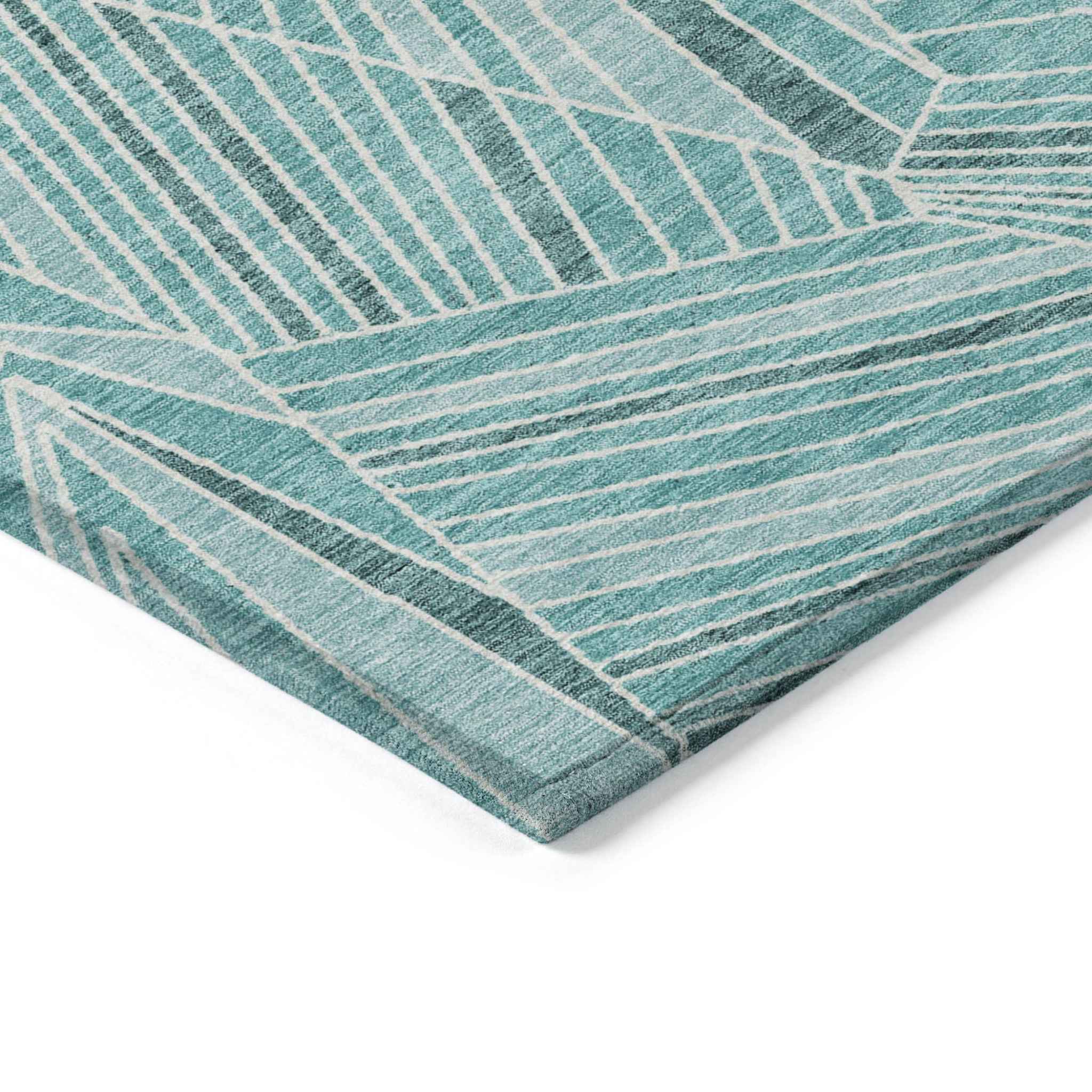 5' X 8' Teal Blue And Ivory Geometric Washable Indoor Outdoor Area Rug