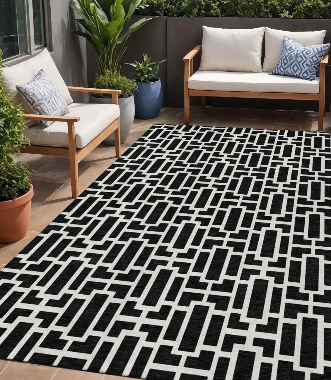 5' X 8' Black And Ivory Geometric Washable Indoor Outdoor Area Rug