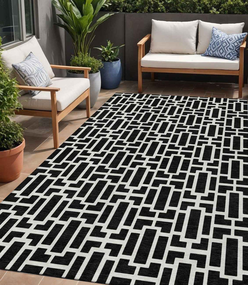 5' X 8' Black And Ivory Geometric Washable Indoor Outdoor Area Rug