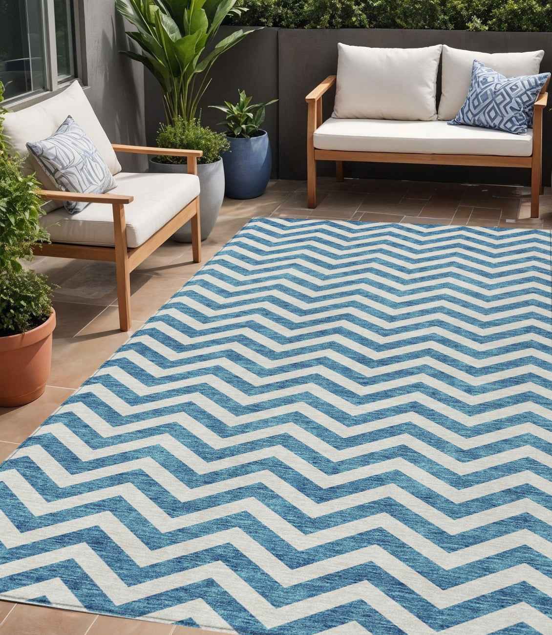 5' X 8' Teal Blue And Ivory Chevron Washable Indoor Outdoor Area Rug
