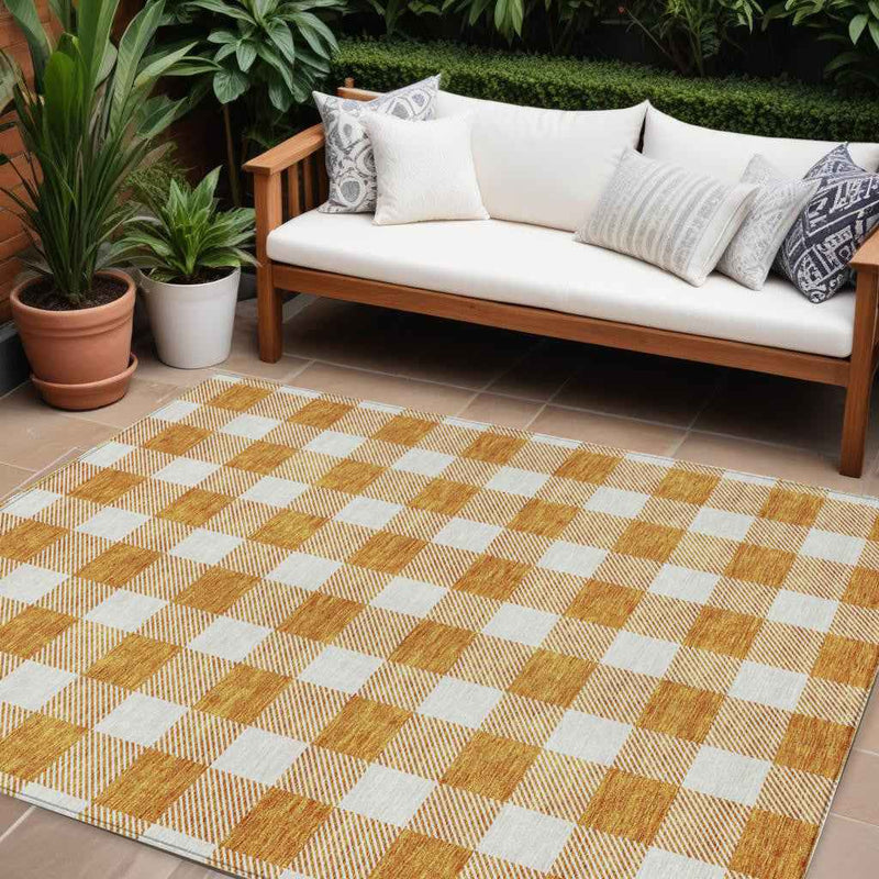 10' X 14' Orange And Beige Plaid Washable Indoor Outdoor Area Rug