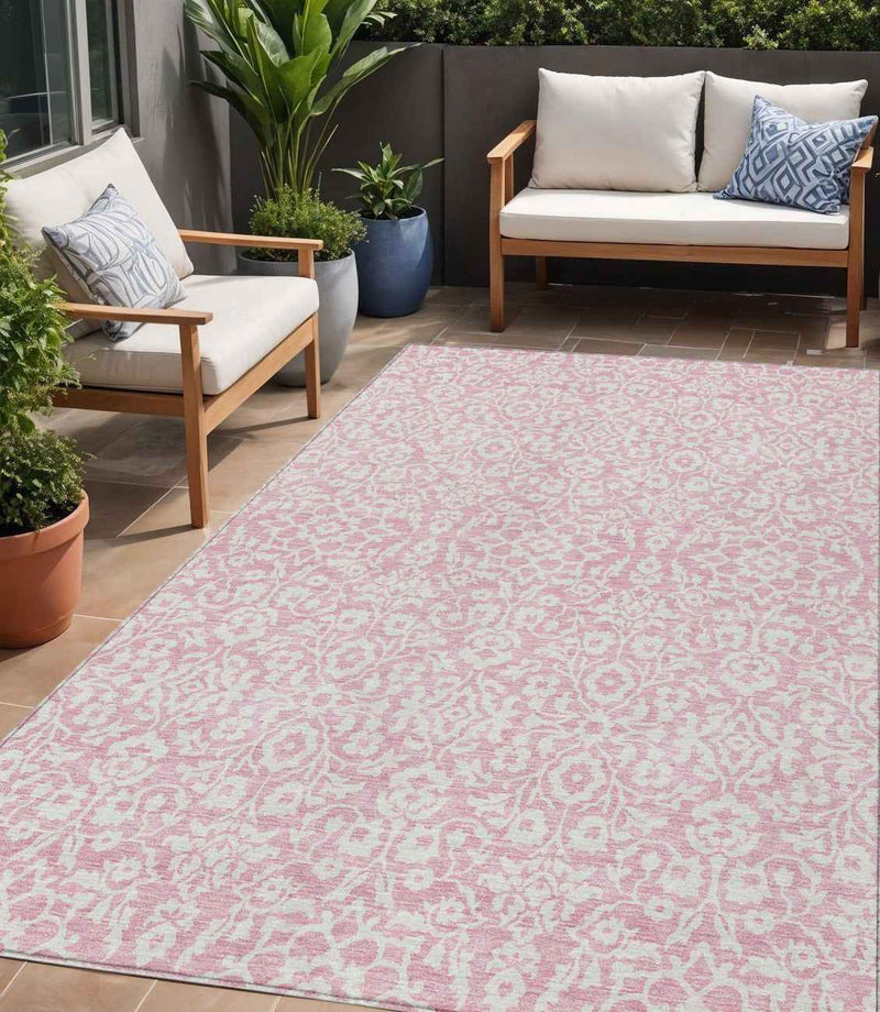 5' X 8' Pink And Ivory Damask Washable Indoor Outdoor Area Rug