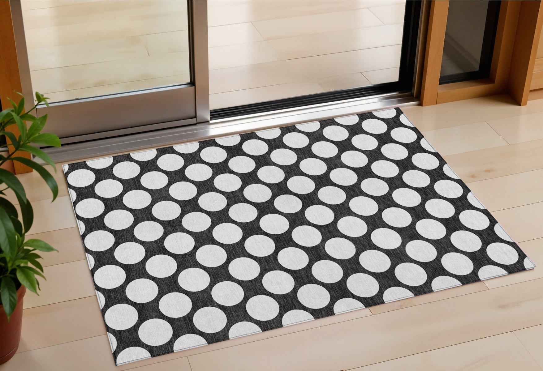 3' X 5' Black And Ivory Polka Dot Washable Indoor Outdoor Area Rug