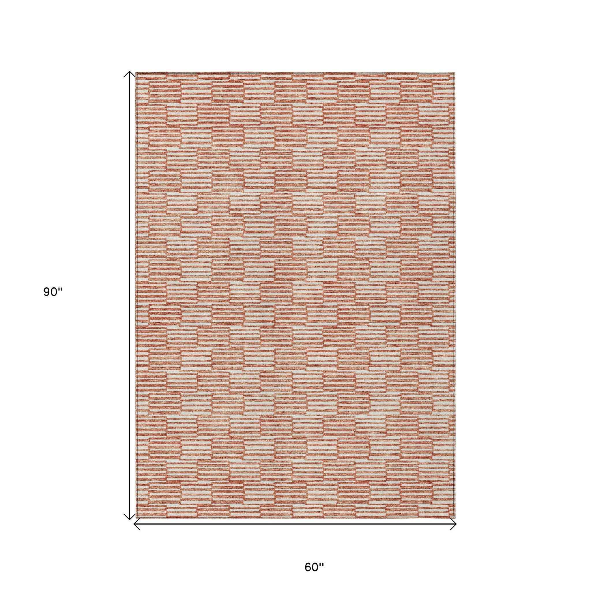 5' X 8' Salmon And Ivory Geometric Washable Indoor Outdoor Area Rug