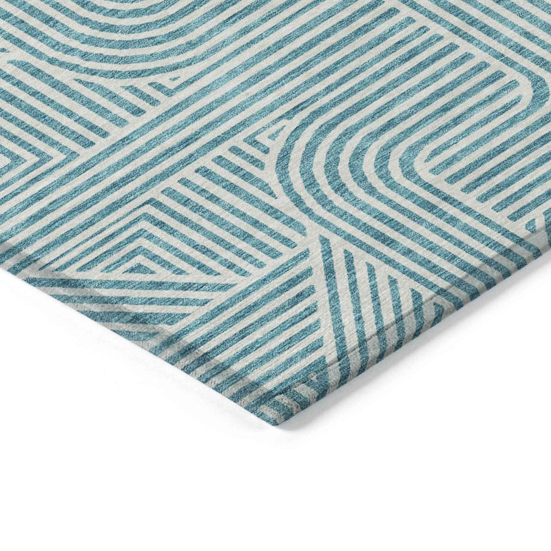 5' X 8' Teal Blue And Ivory Abstract Washable Indoor Outdoor Area Rug