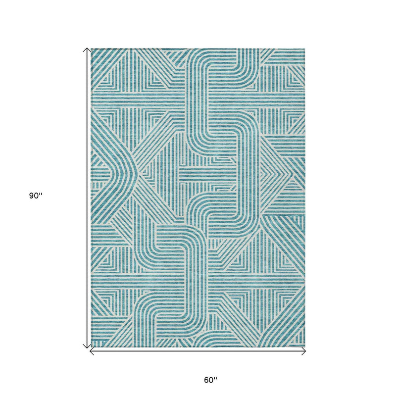 5' X 8' Teal Blue And Ivory Abstract Washable Indoor Outdoor Area Rug