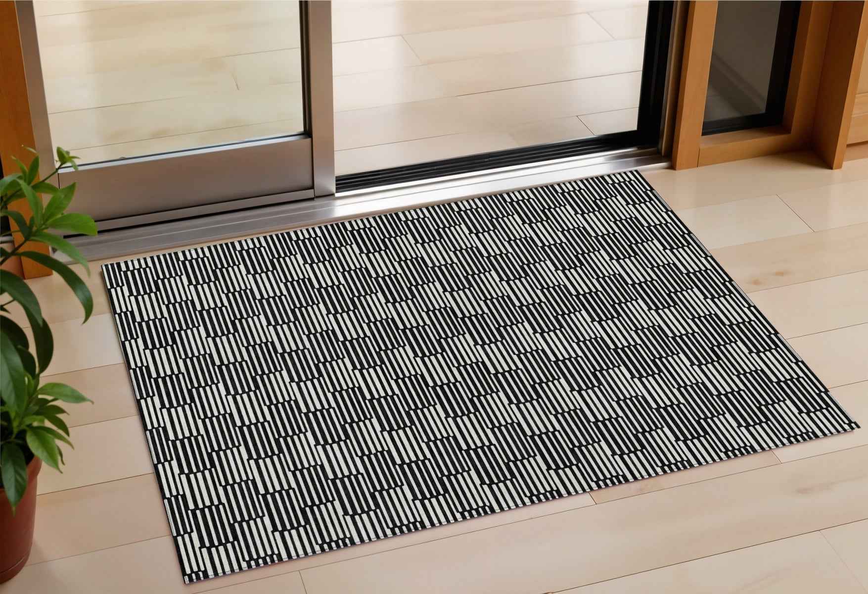 3' X 5' Black And Ivory Geometric Washable Indoor Outdoor Area Rug