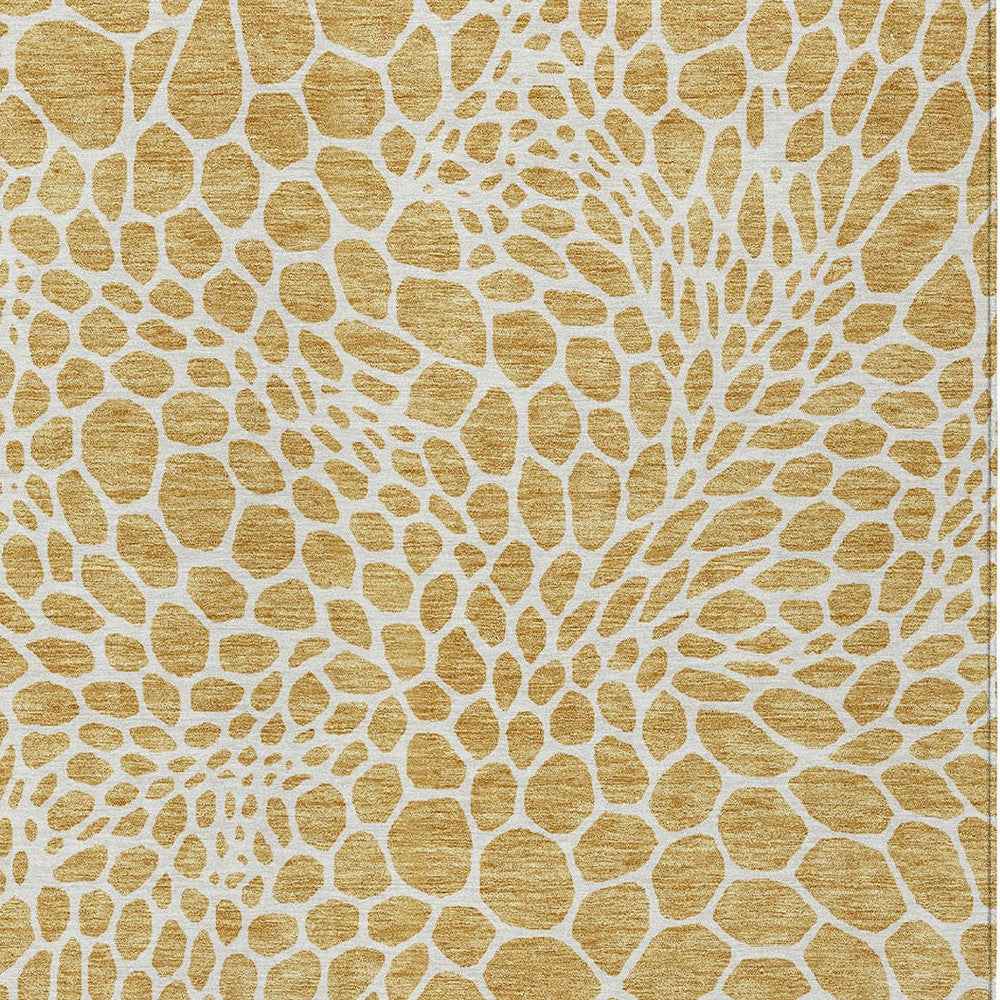 5' X 8' Gold And Ivory Geometric Washable Indoor Outdoor Area Rug