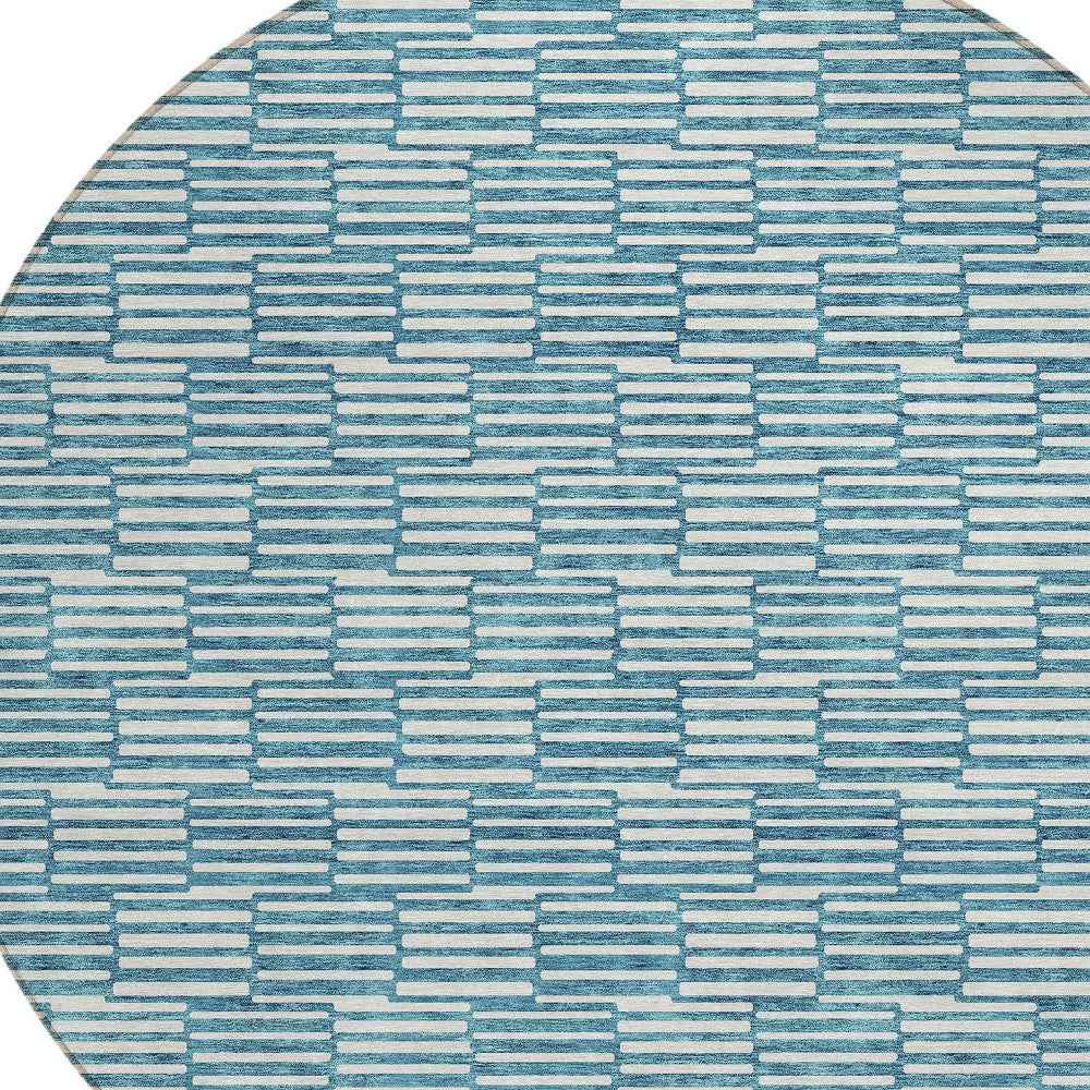 8' Teal Blue And Ivory Round Geometric Washable Indoor Outdoor Area Rug