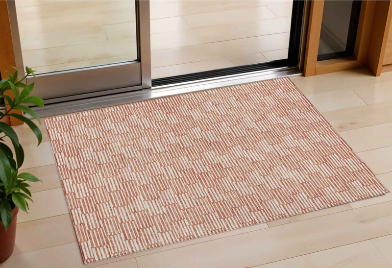 3' X 5' Salmon And Ivory Geometric Washable Indoor Outdoor Area Rug