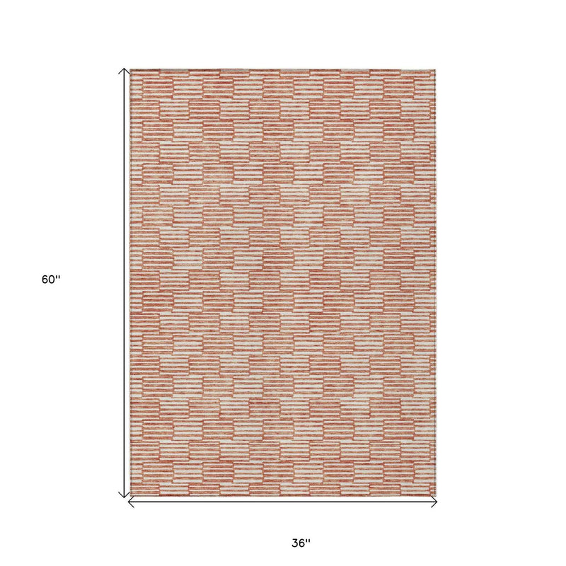 3' X 5' Salmon And Ivory Geometric Washable Indoor Outdoor Area Rug