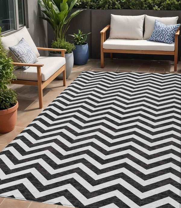 5' X 8' Black And Ivory Chevron Washable Indoor Outdoor Area Rug