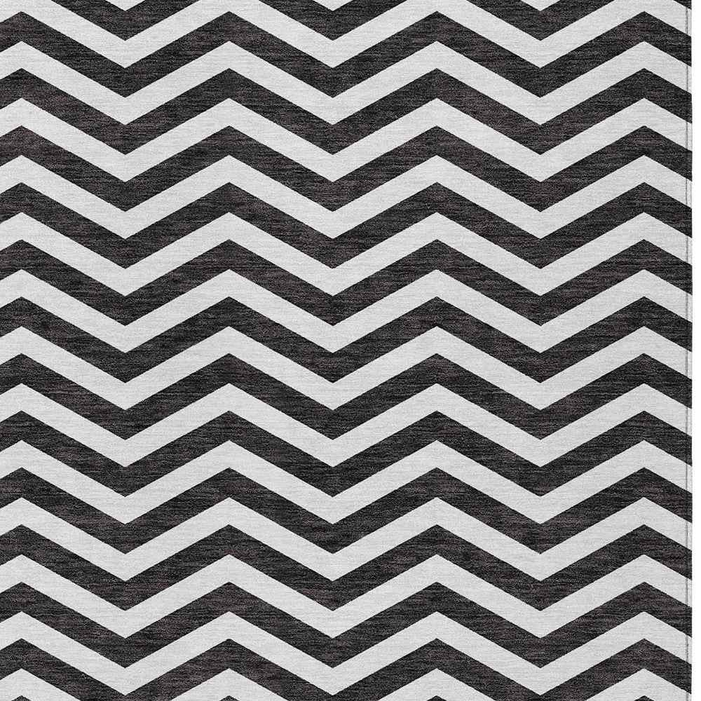 5' X 8' Black And Ivory Chevron Washable Indoor Outdoor Area Rug