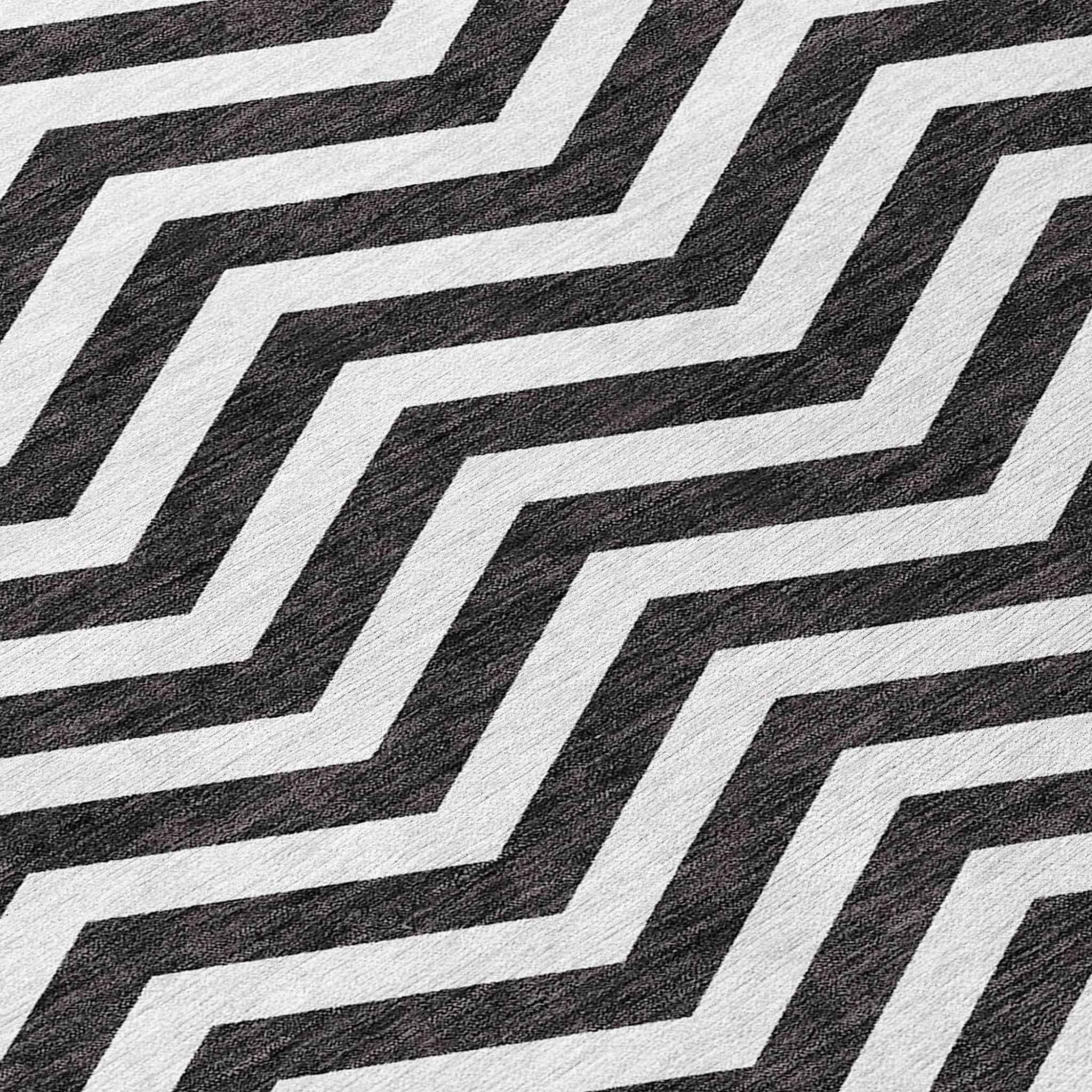 5' X 8' Black And Ivory Chevron Washable Indoor Outdoor Area Rug