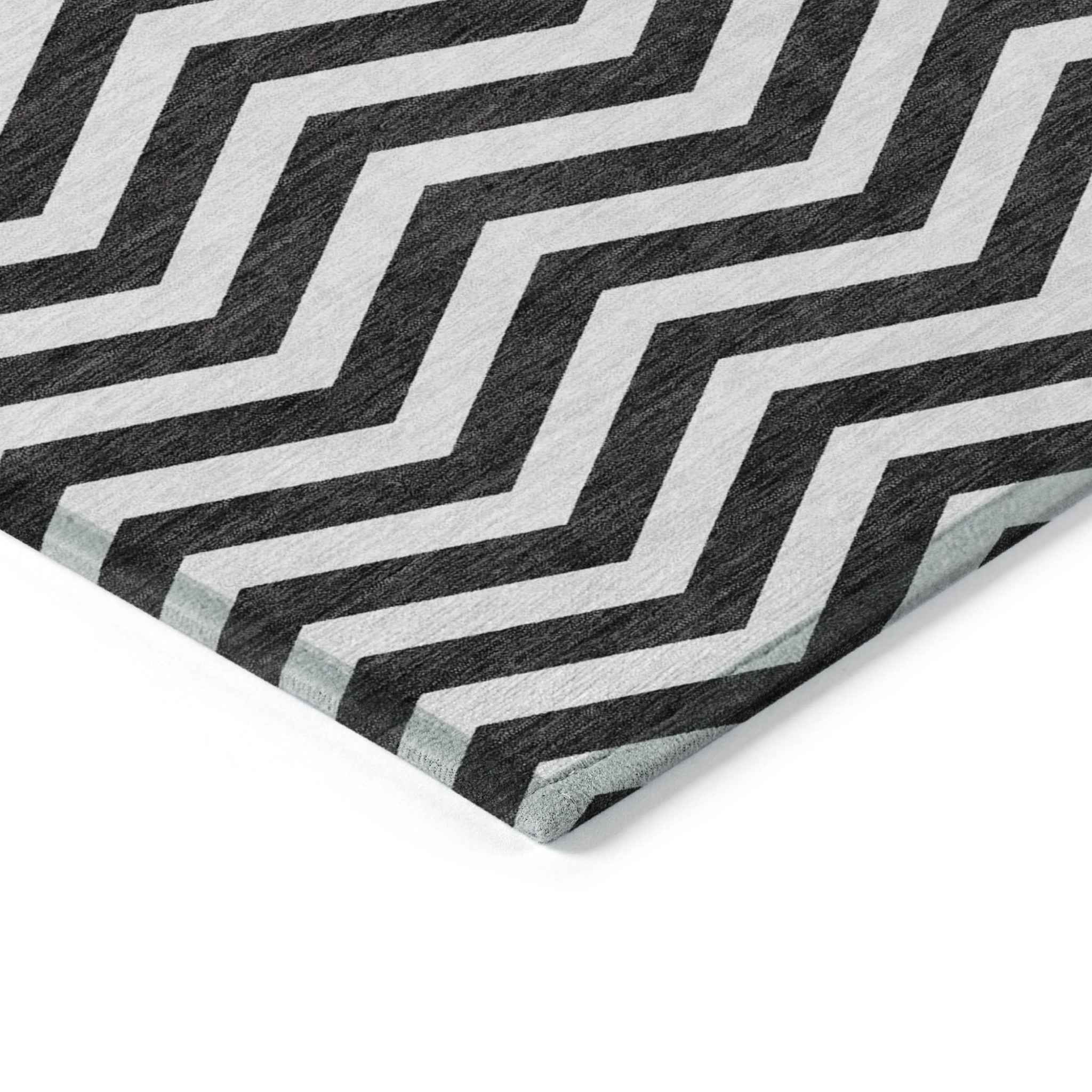 5' X 8' Black And Ivory Chevron Washable Indoor Outdoor Area Rug