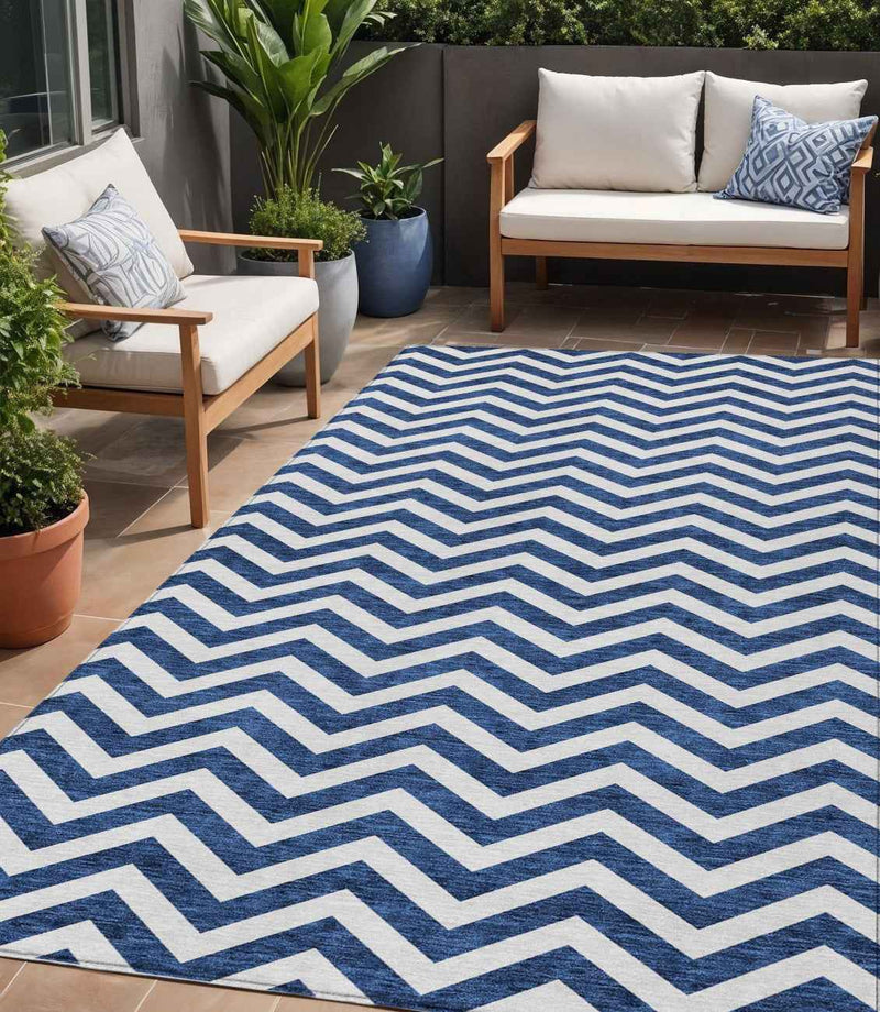 5' X 8' Navy Blue And Ivory Chevron Washable Indoor Outdoor Area Rug