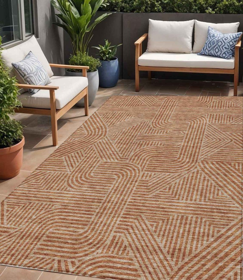 5' X 8' Terra Cotta And Brown Abstract Washable Indoor Outdoor Area Rug