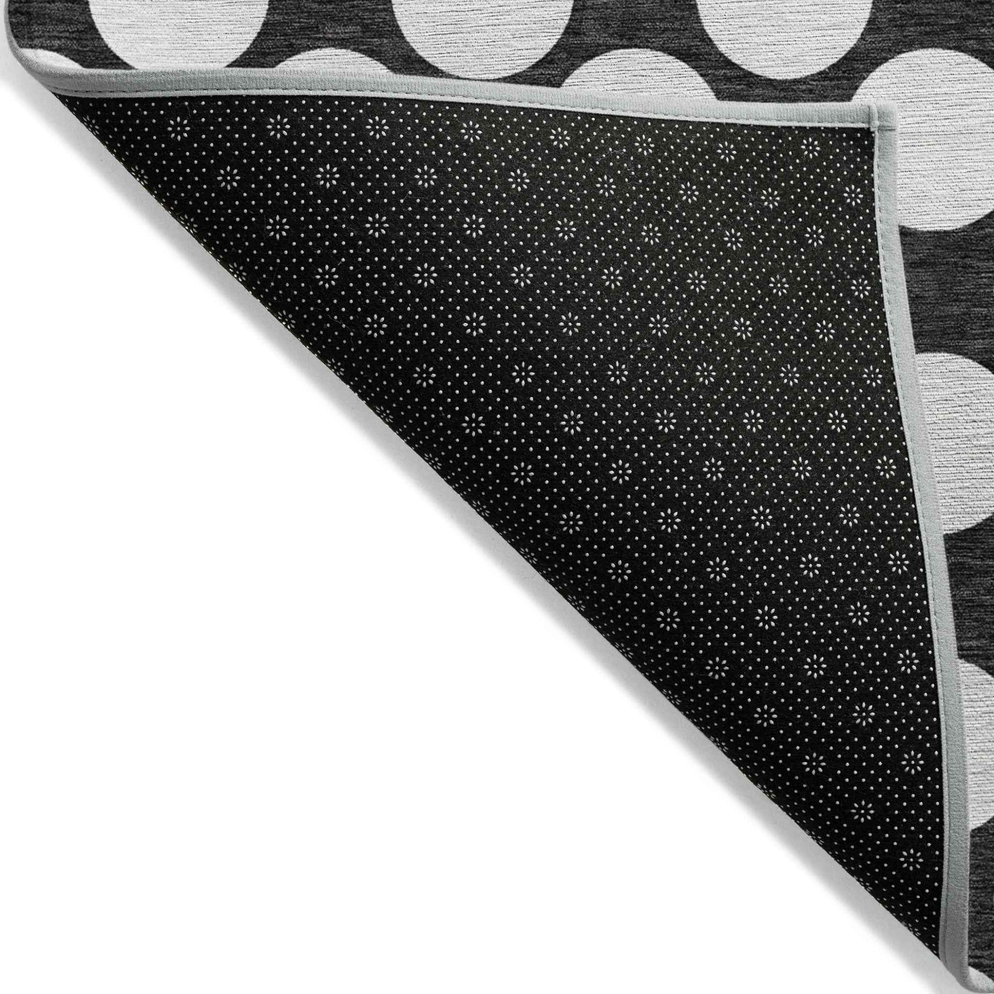 8' X 10' Black And Ivory Polka Dot Washable Indoor Outdoor Area Rug