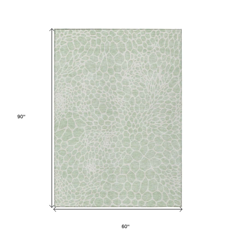 5' X 8' Mint Green And Ivory Geometric Washable Indoor Outdoor Area Rug