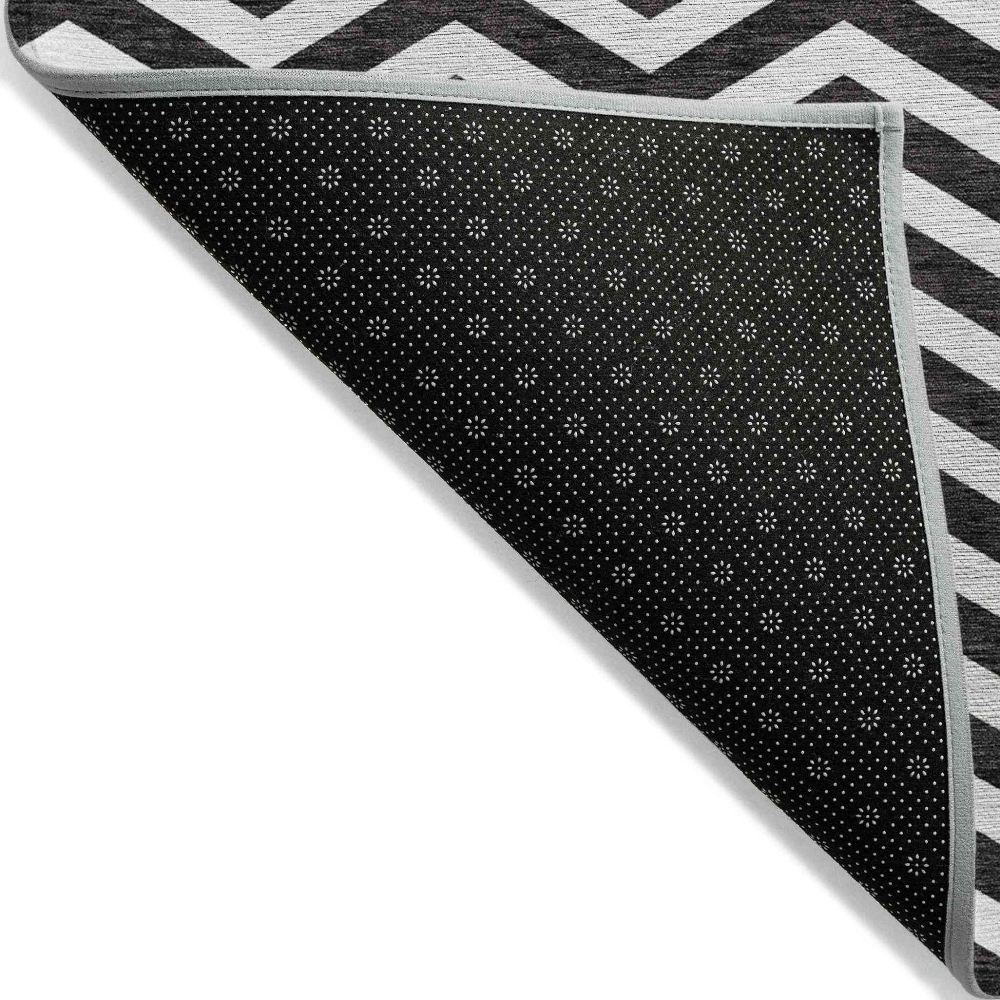 9' X 12' Black And Ivory Chevron Washable Indoor Outdoor Area Rug