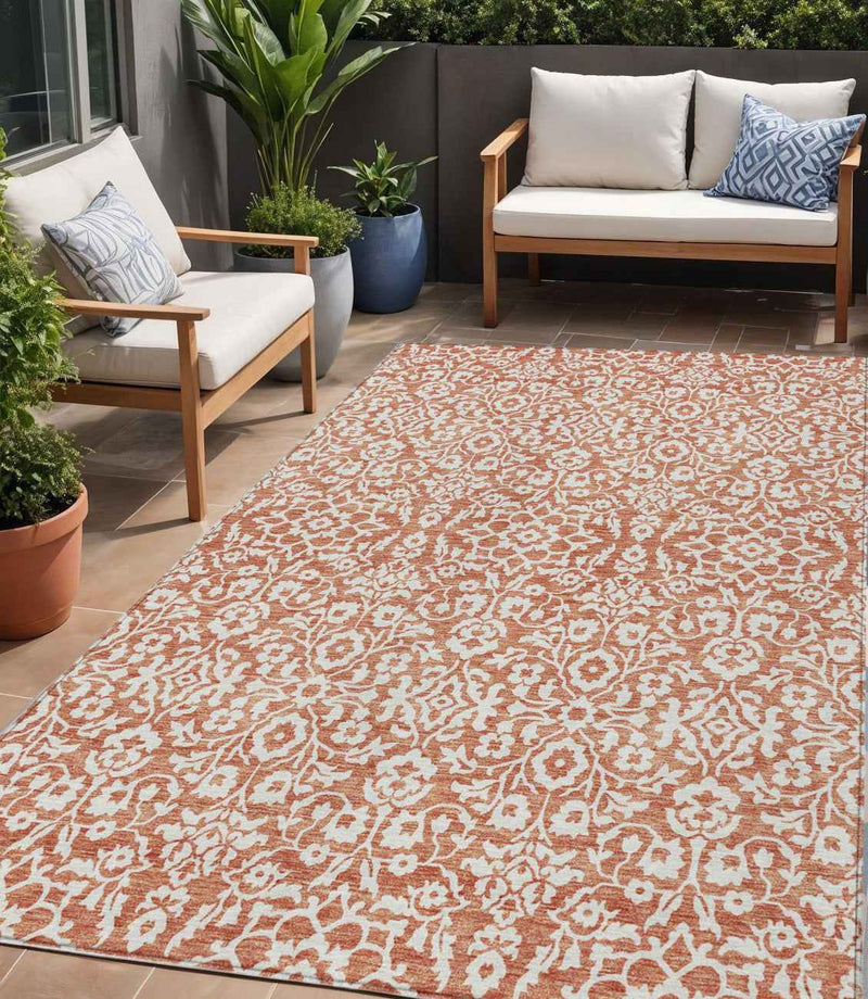 5' X 8' Coral And Ivory Damask Washable Indoor Outdoor Area Rug