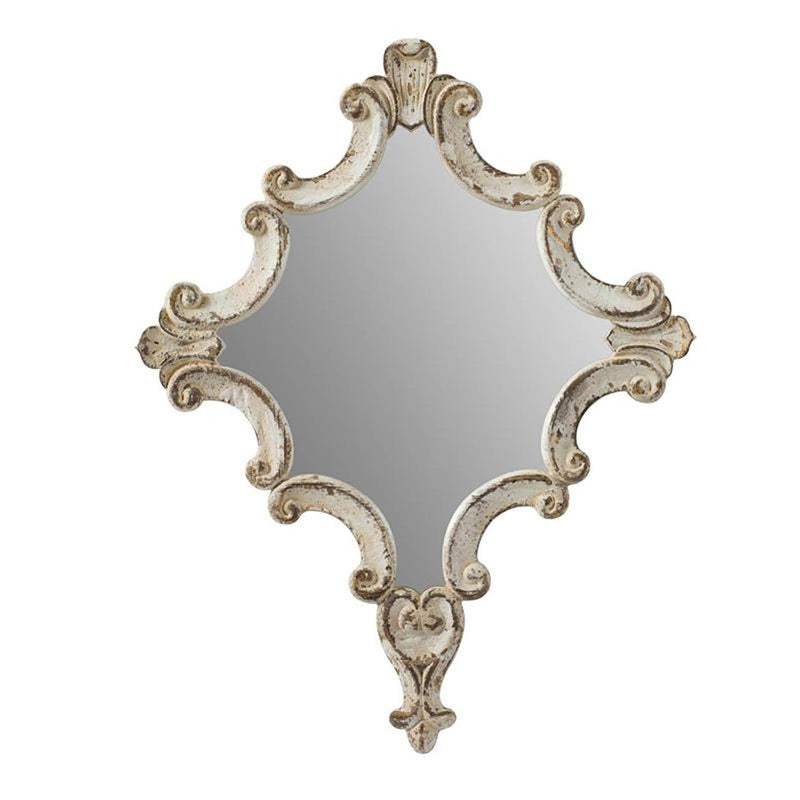 Accent mirror with distressed white ornate wood frame, carved scrolls and fleur-de-lis points