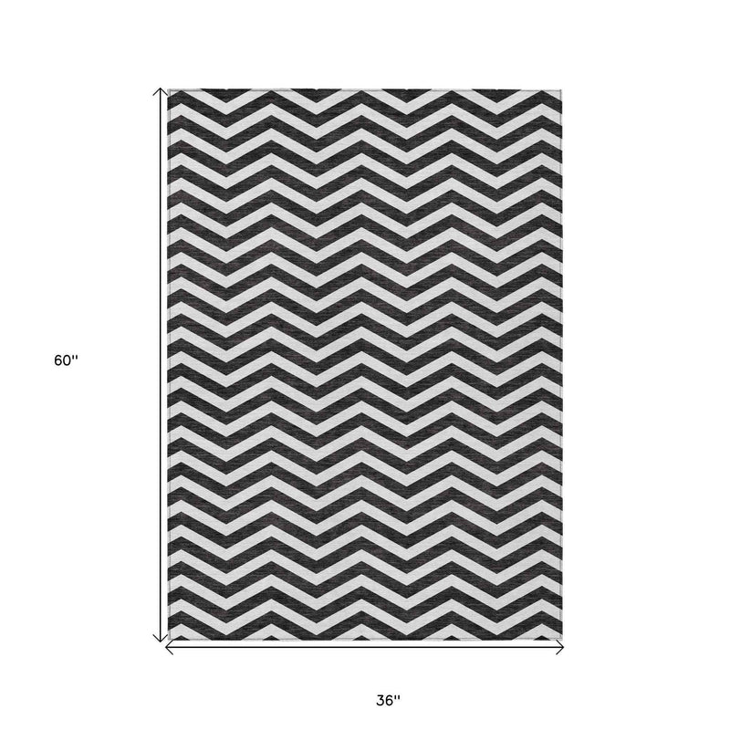 3' X 5' Black And Ivory Chevron Washable Indoor Outdoor Area Rug