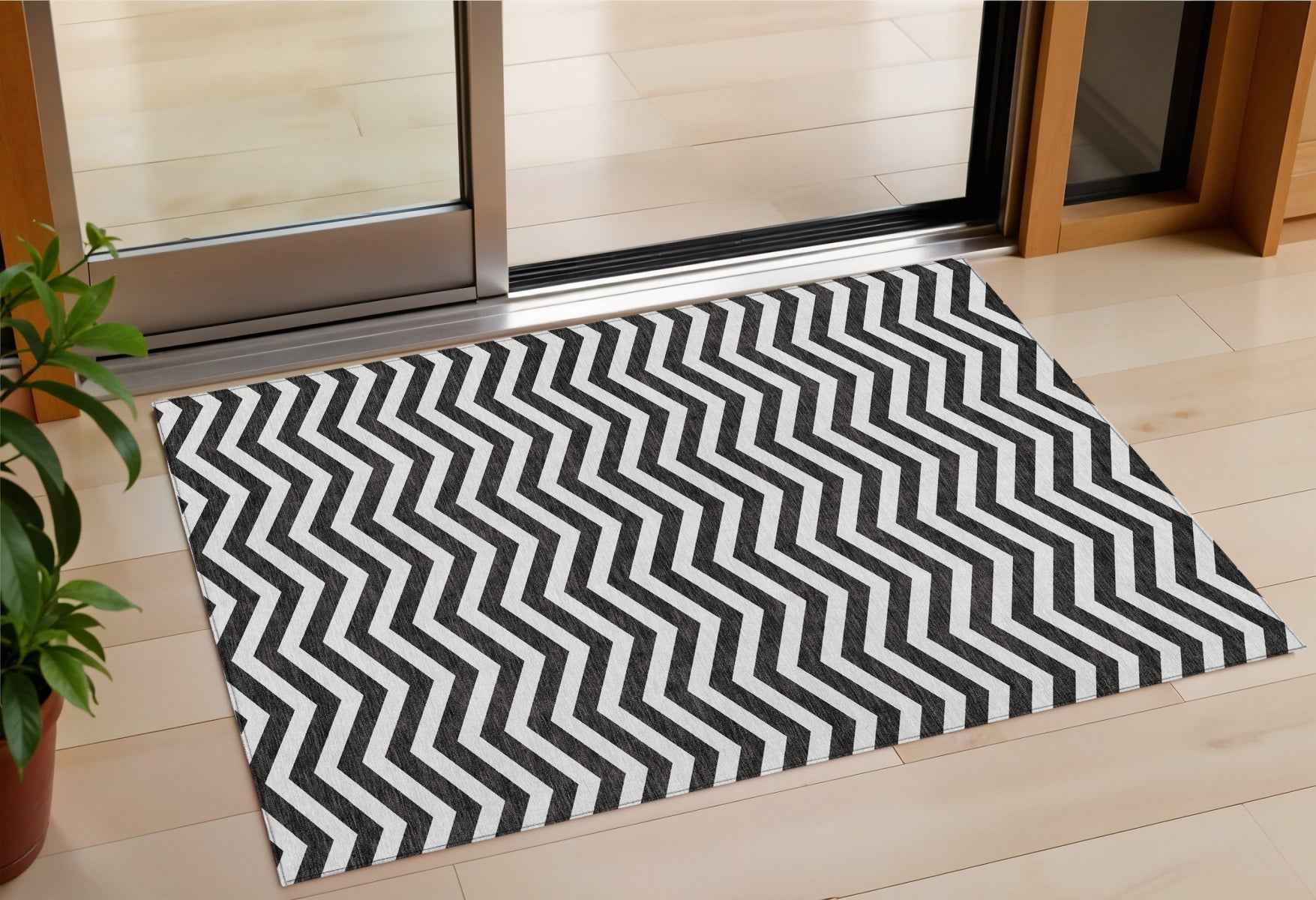 3' X 5' Black And Ivory Chevron Washable Indoor Outdoor Area Rug