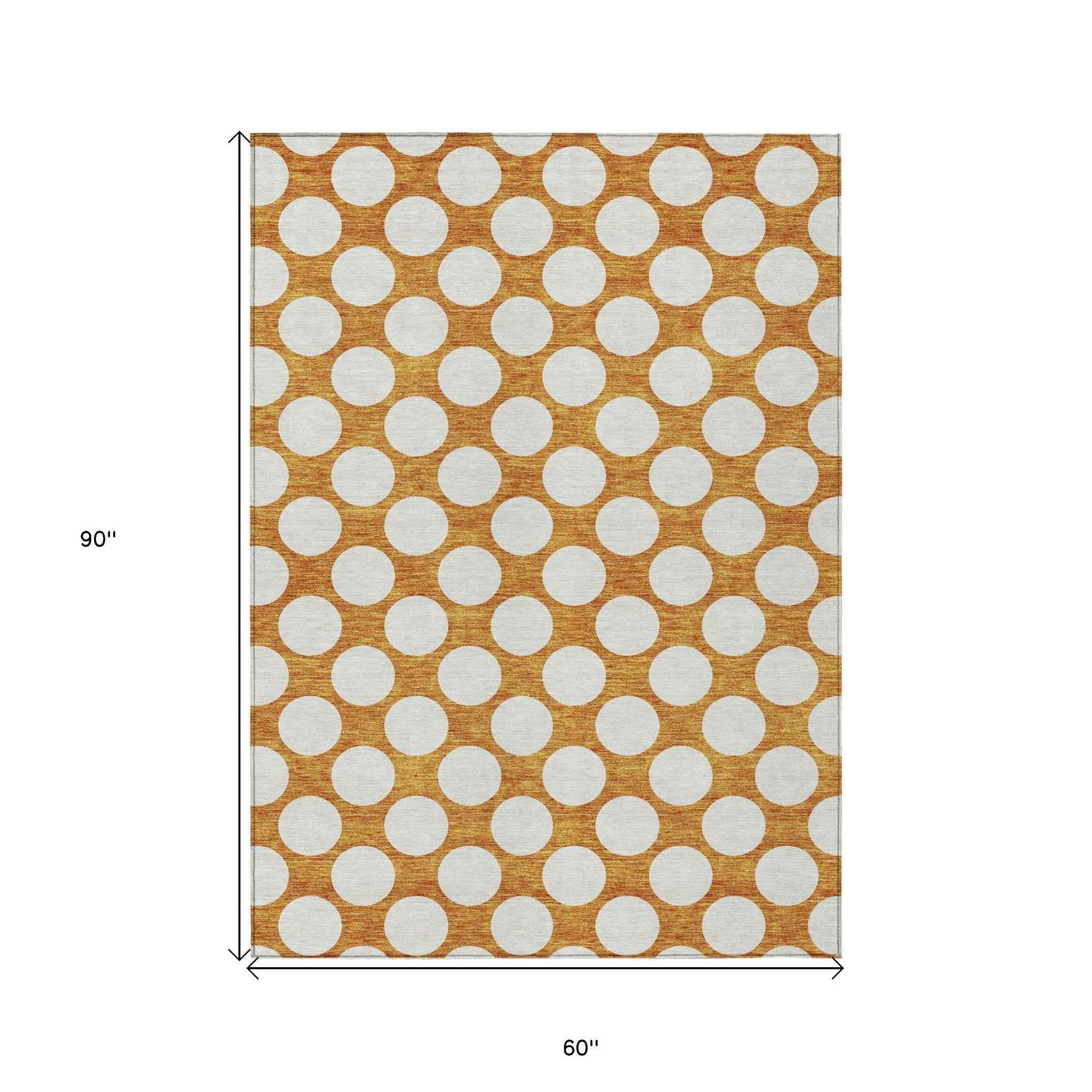 5' X 8' Orange And Ivory Polka Dot Washable Indoor Outdoor Area Rug