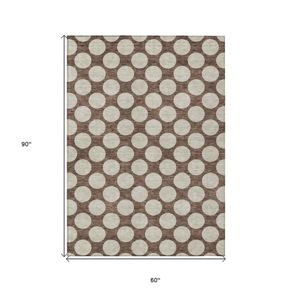 5' X 8' Brown And Beige Polka Dot Washable Indoor Outdoor Area Rug