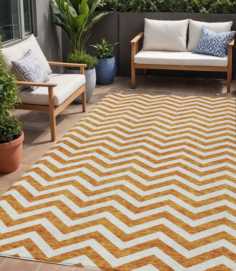 5' X 8' Orange And Beige Chevron Washable Indoor Outdoor Area Rug