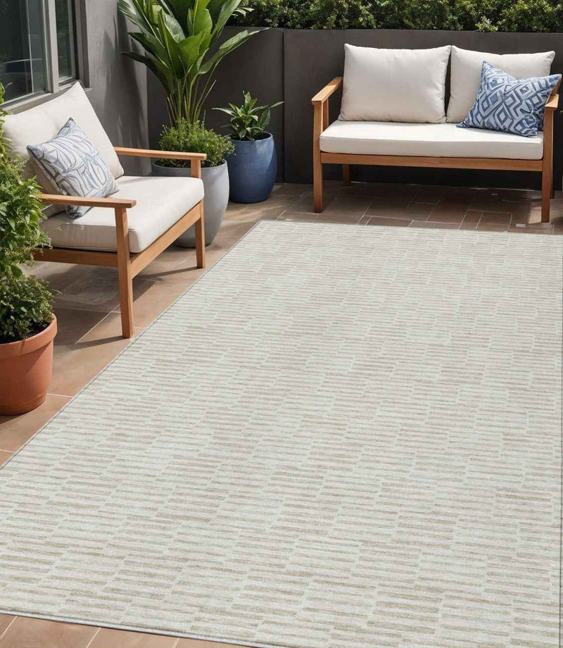 5' X 8' Ivory And Beige Geometric Washable Indoor Outdoor Area Rug