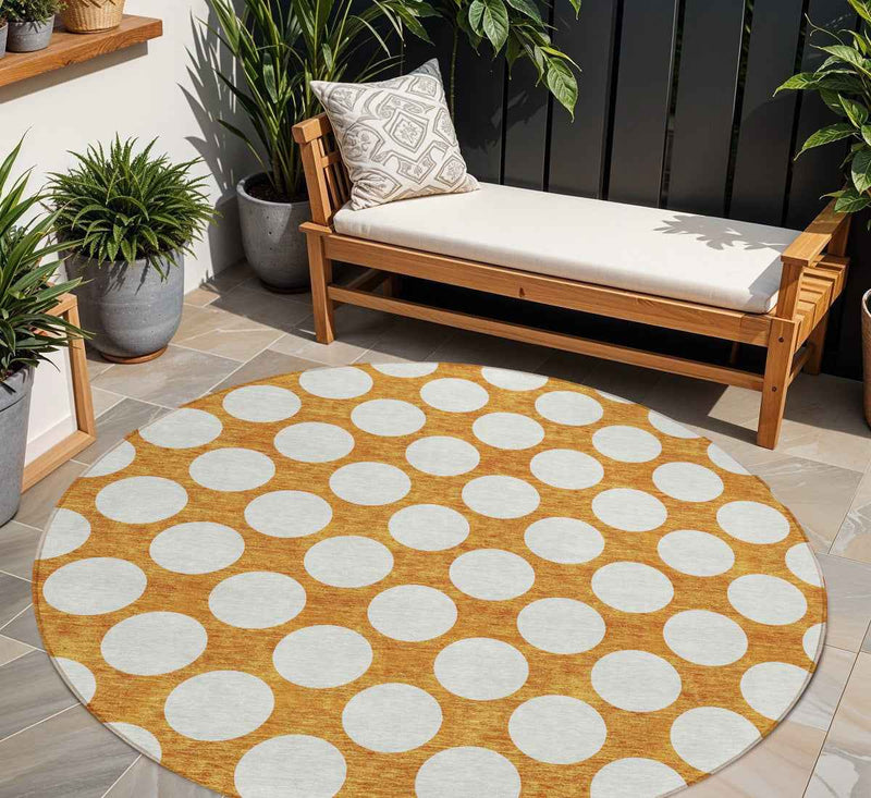 8' Orange And Ivory Round Polka Dot Washable Indoor Outdoor Area Rug