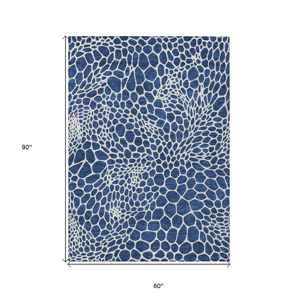 5' X 8' Navy Blue And Ivory Geometric Washable Indoor Outdoor Area Rug