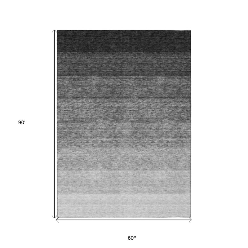 5' X 8' Black And Ivory Ombre Washable Indoor Outdoor Area Rug